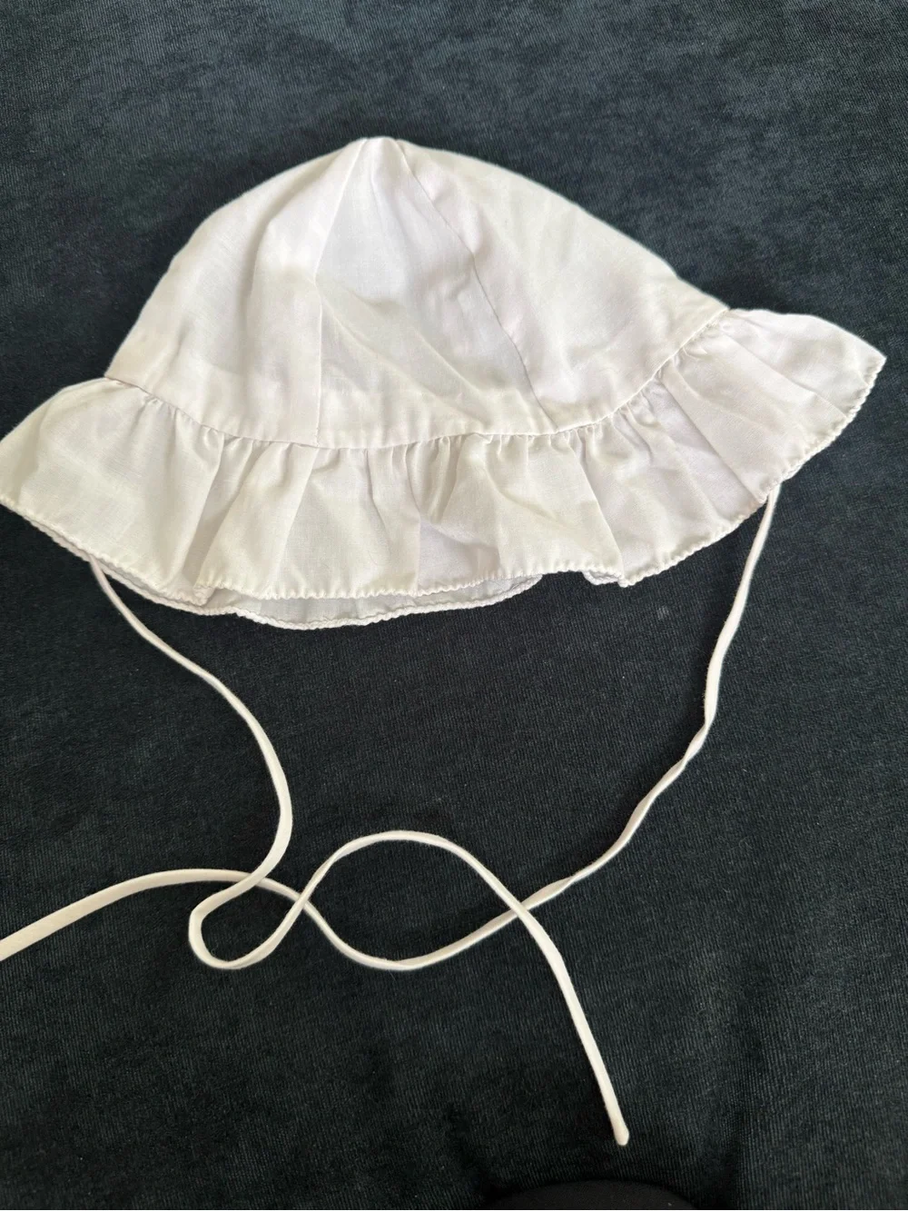 Two baby hats/bonnets